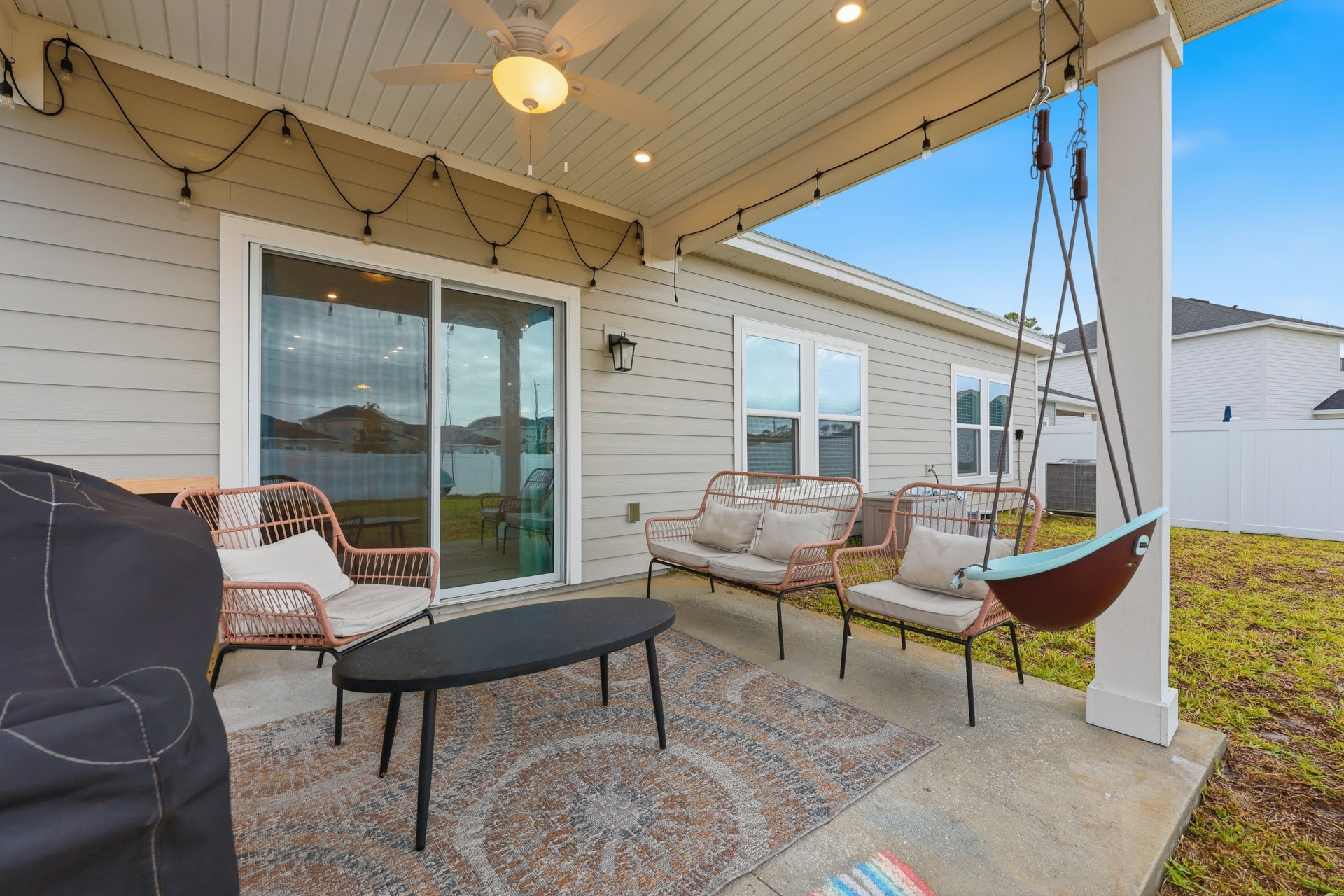 95026 Rocky Place Fernandina Beach, FL 32034 - Photo 48 of 53 a backyard of a house with barbeque oven table and chairs