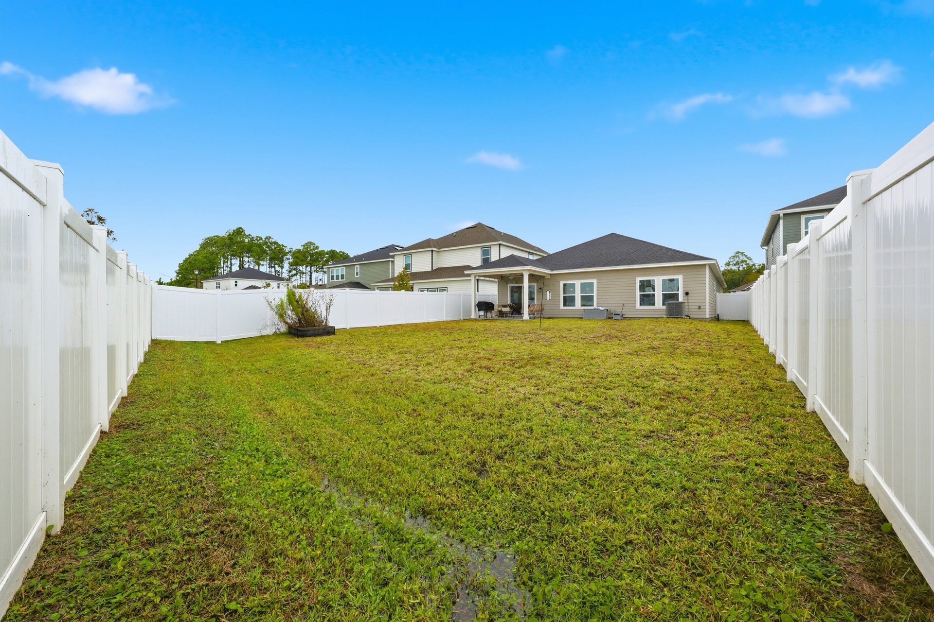 95026 Rocky Place Fernandina Beach, FL 32034 - Photo 49 of 53 a view of a house with a yard