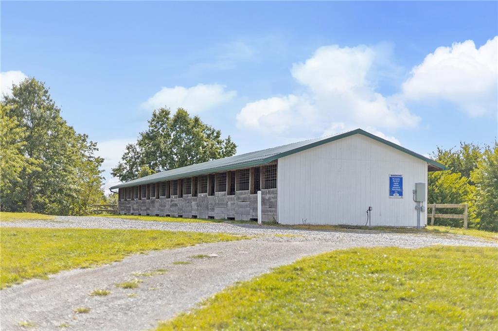 206 Lee Road Grove City, PA 16127 - Photo 12 of 44 Spacious stables offer exceptional potential for boarding, training, and daily horse care.