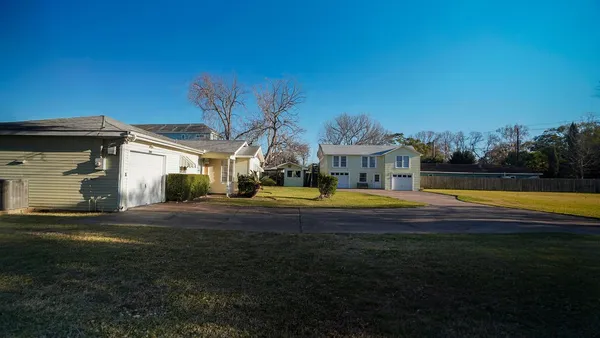 a view of a house with a swimming pool