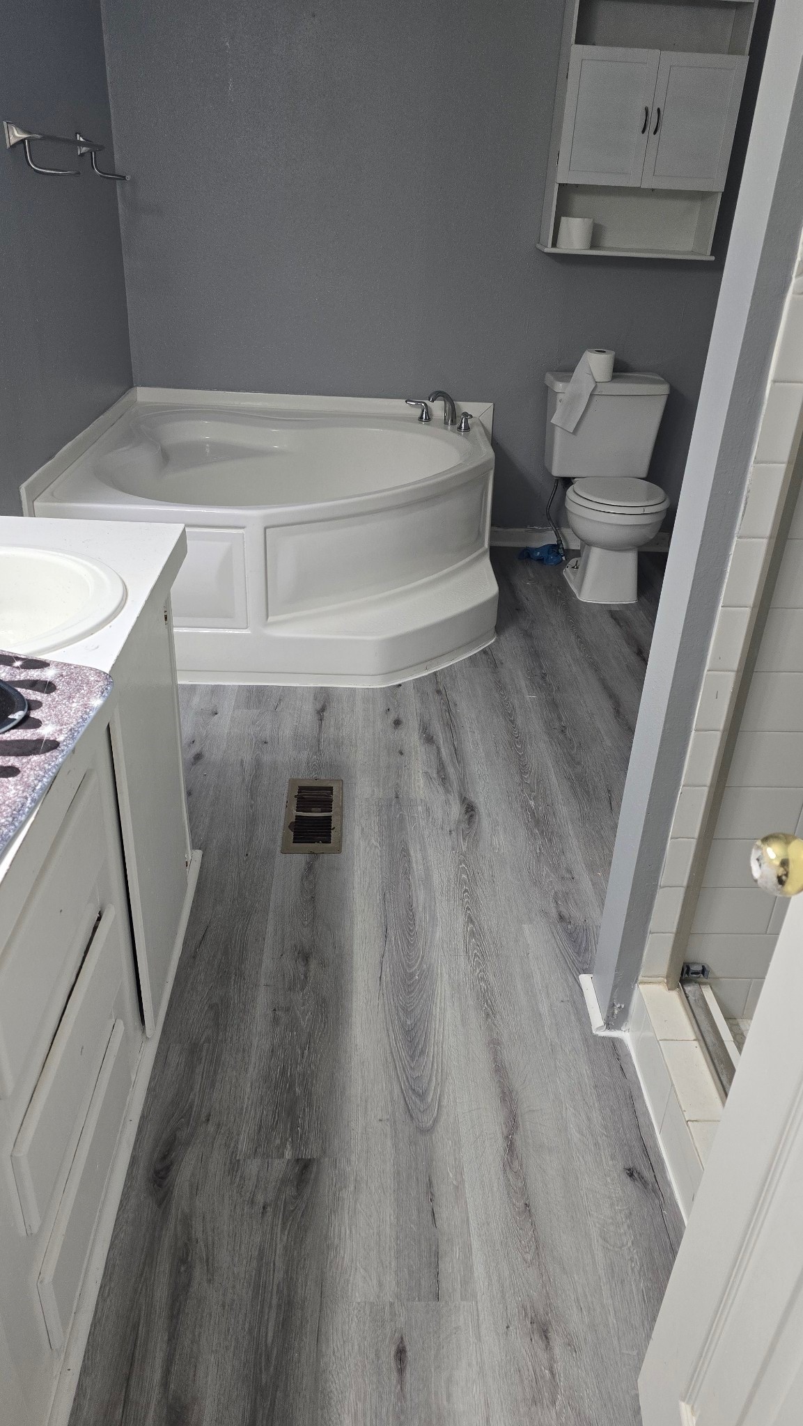 1610 Texas Street Alvin, TX 77511 - Photo 12 of 22 a bathroom with a sink and toilet