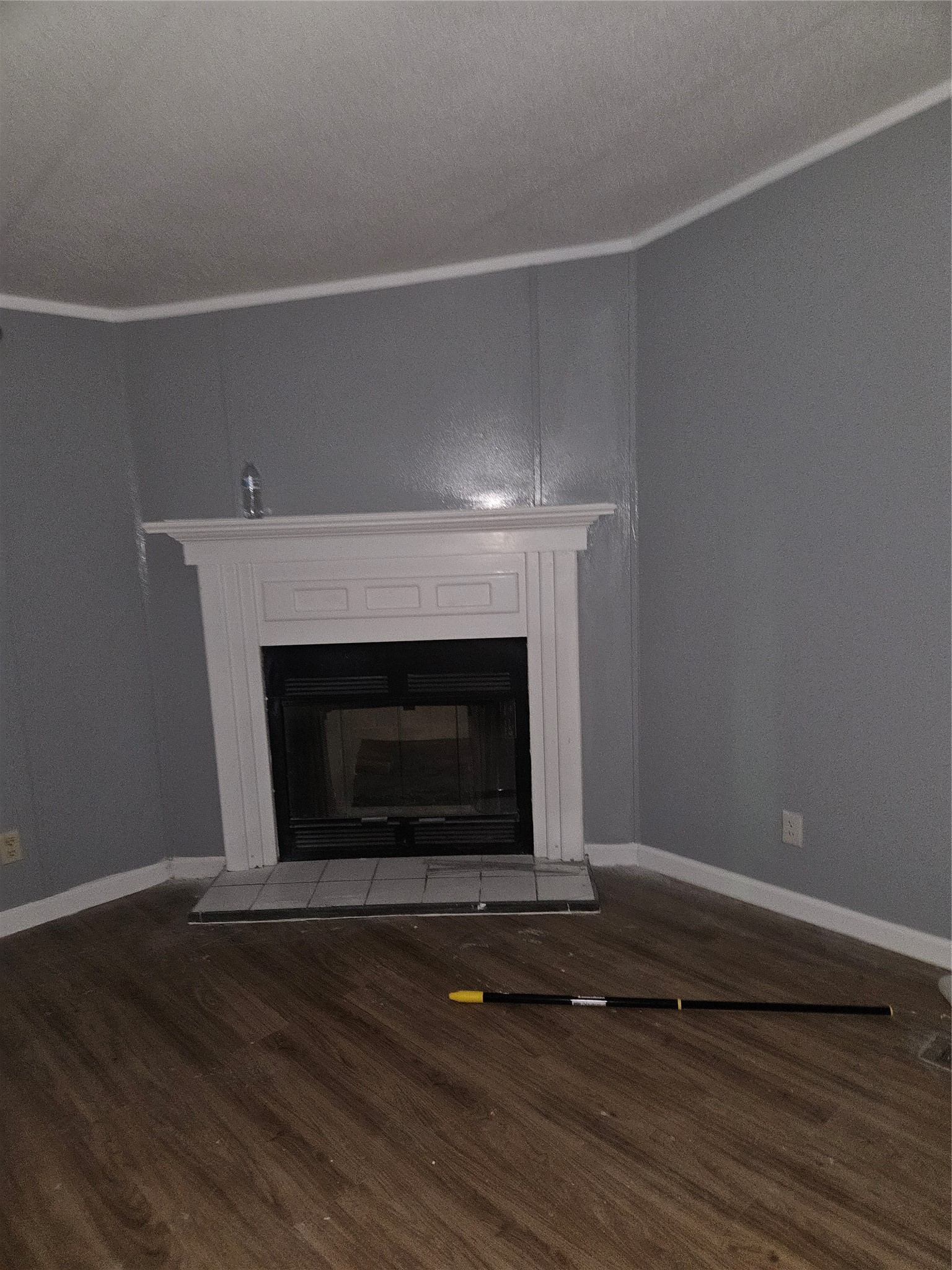 1610 Texas Street Alvin, TX 77511 - Photo 8 of 22 a living room with a fireplace