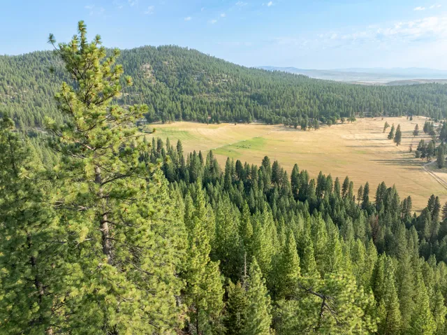 a view of lake with mountain in background