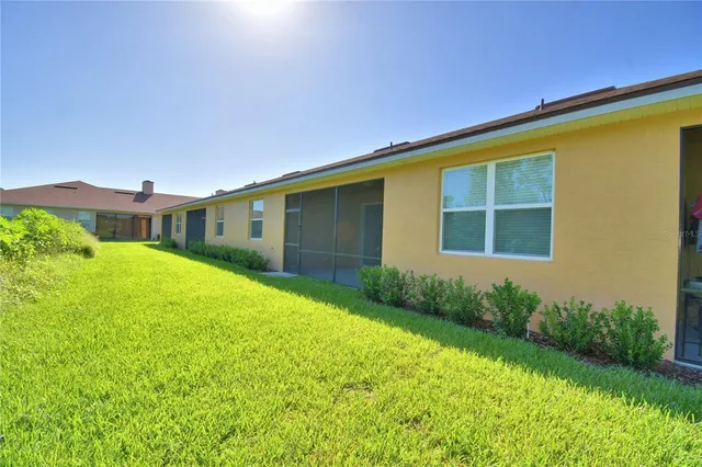 a view of a garden with a apartment