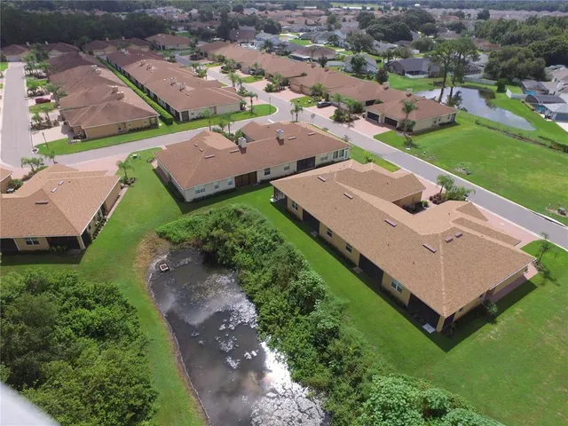 a media room with lots of chairs and a projector screen