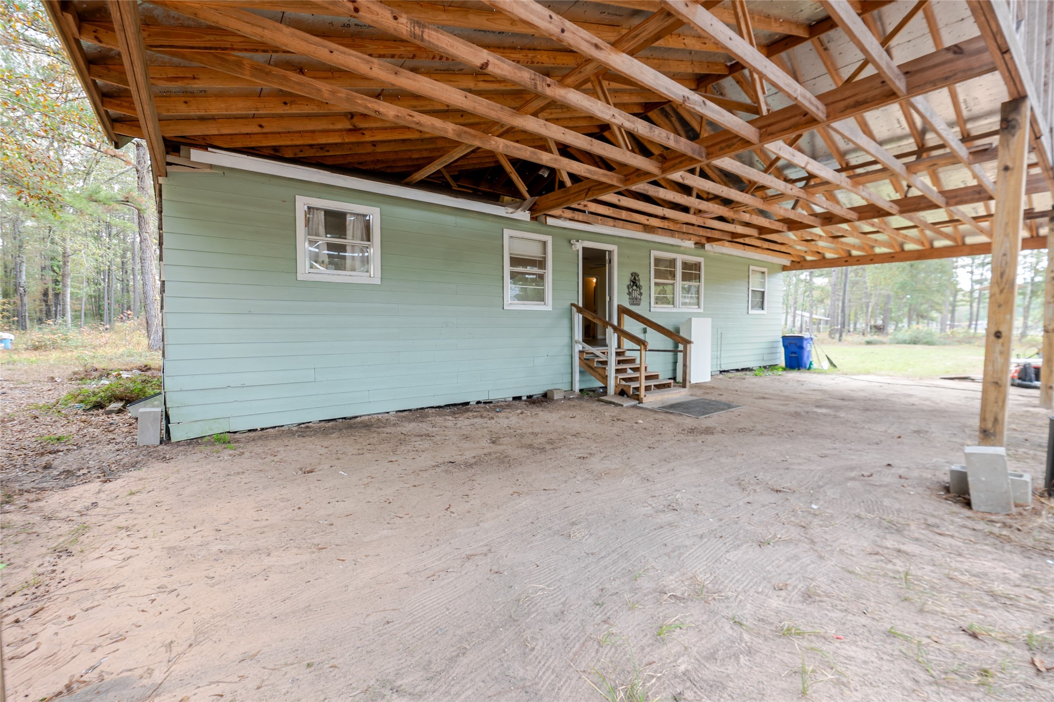 800 Butler Drive Cleveland, TX 77328 - Photo 4 of 11 a view of a room with wooden walls
