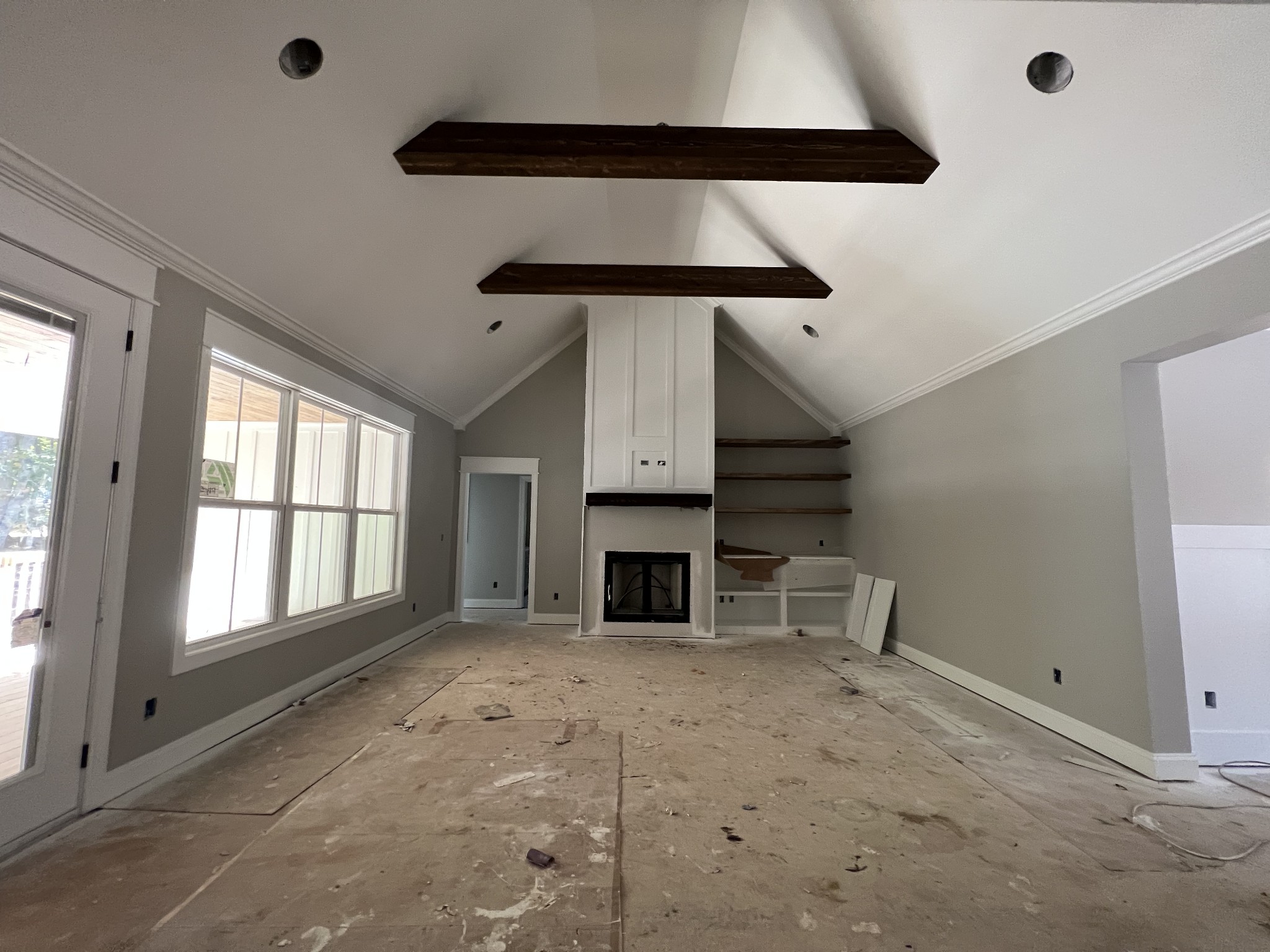 545 Delacy Drive Fairview, TN 37062 - Photo 4 of 18 an empty room with windows and fireplace