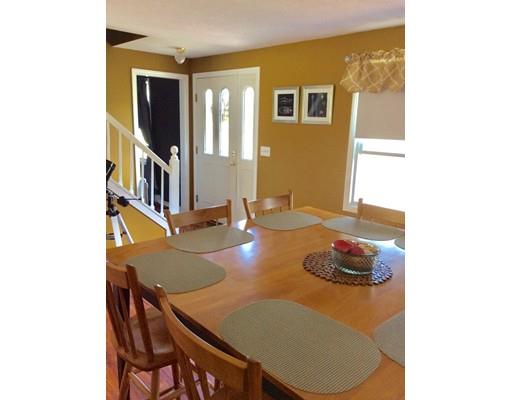 168 Corbin Road Dudley, MA 01571 - Photo 11 of 42 a living room with table and chairs