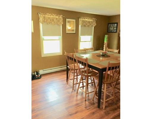 168 Corbin Road Dudley, MA 01571 - Photo 12 of 42 a dining room with furniture and wooden floor