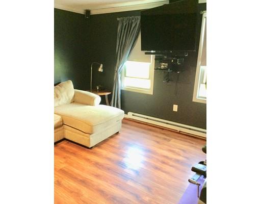 168 Corbin Road Dudley, MA 01571 - Photo 15 of 42 a bedroom with a bed and a window