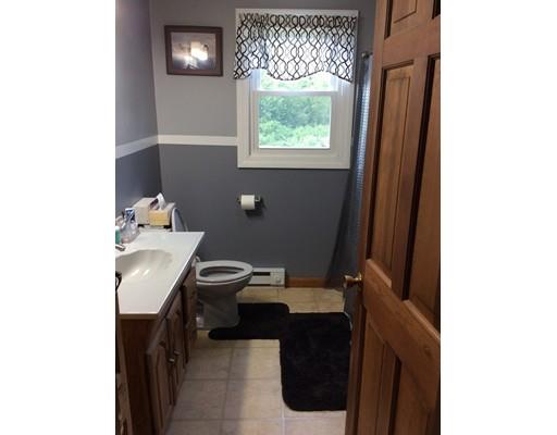 168 Corbin Road Dudley, MA 01571 - Photo 33 of 42 a view of a bathroom with a sink and a window