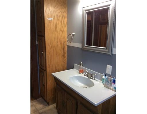 168 Corbin Road Dudley, MA 01571 - Photo 34 of 42 a bathroom with a sink and a mirror
