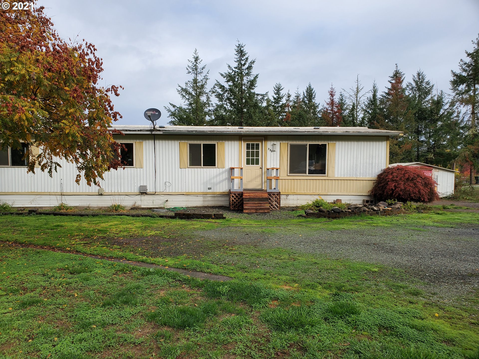 732 Valley View Road Sutherlin, OR 97479 - Photo 1 of 16 a house view with a garden space