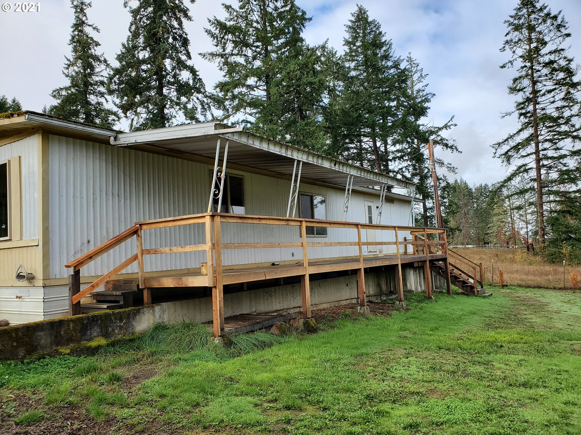 732 Valley View Road Sutherlin, OR 97479 - Photo 2 of 16 a view of a house with a yard