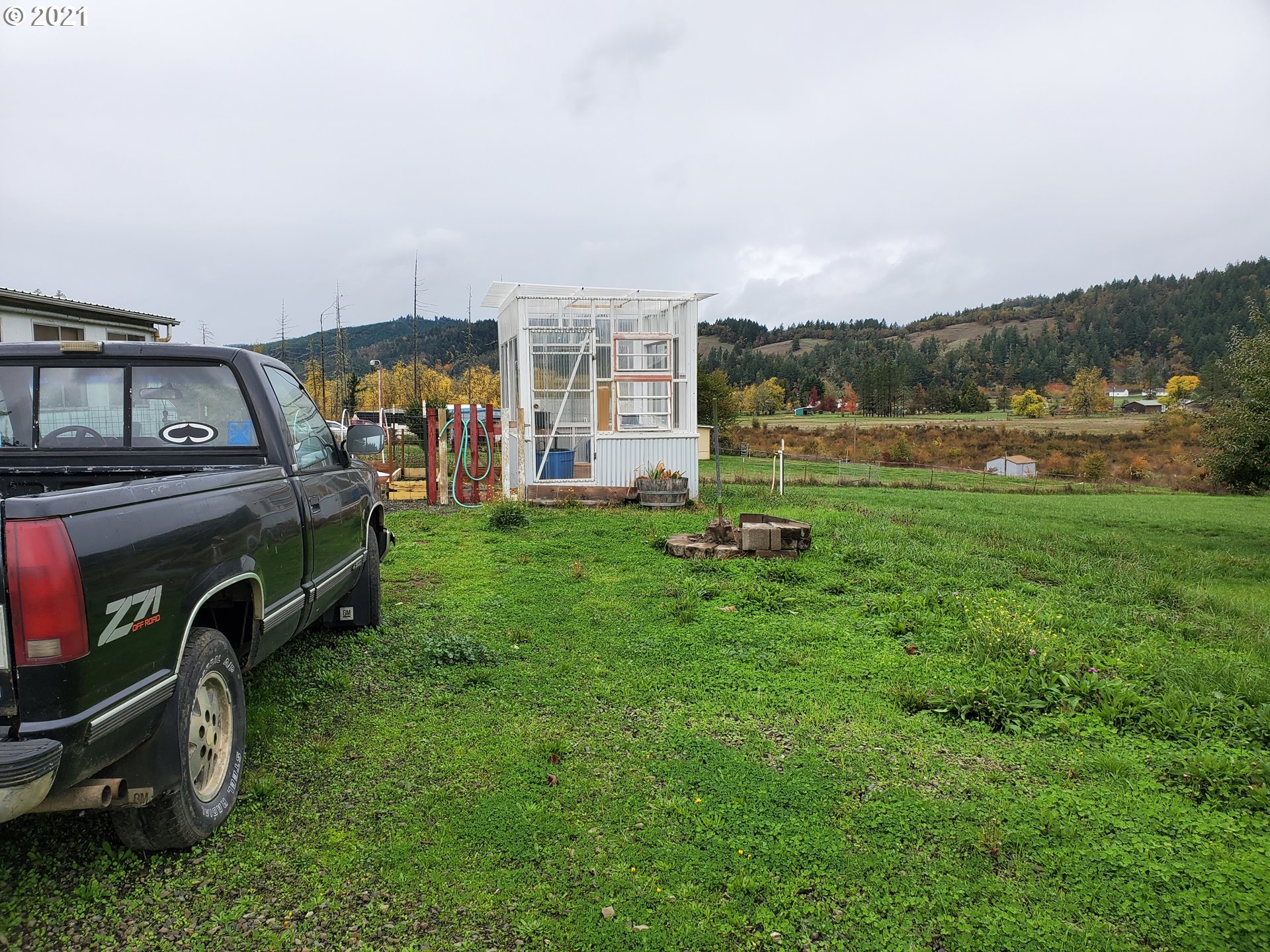 732 Valley View Road Sutherlin, OR 97479 - Photo 13 of 16 a view of a house with a yard
