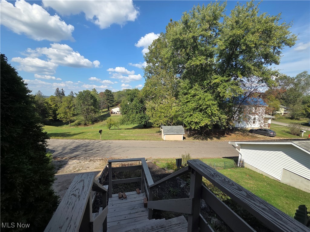 1960 Bellview Road Cambridge, OH 43725 - Photo 21 of 27 View of green lawn with a wooden deck