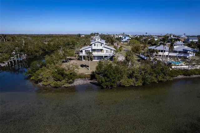 an aerial view of a house with a garden