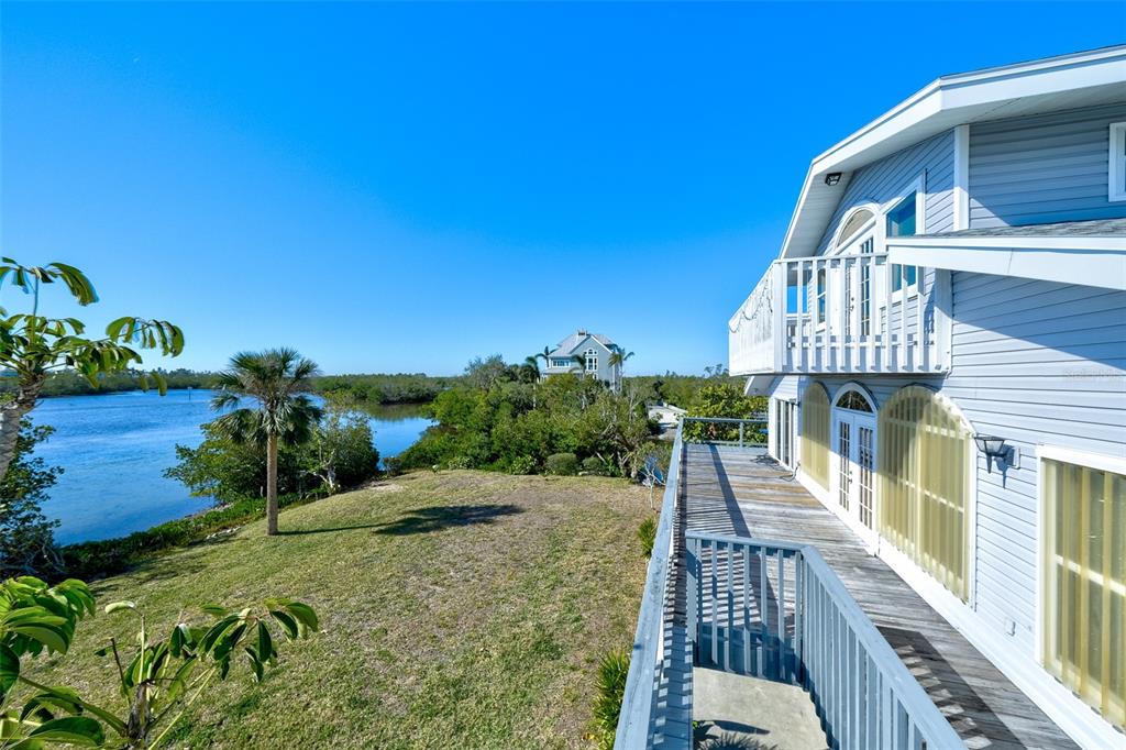 145 Burns Road Terra Ceia, FL 34250 - Photo 4 of 65 a view of a balcony with potted plants