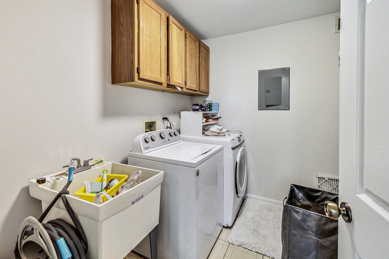 816 Butternut Lane, Unit C Mount Prospect, IL 60056 - Photo 22 of 32 a utility room with dryer and washer