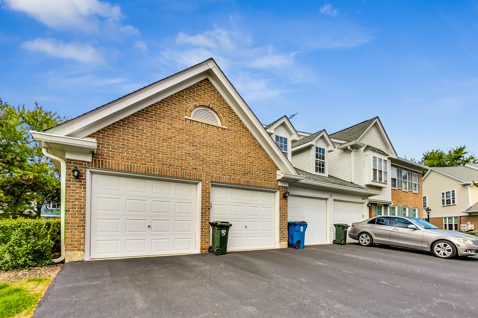 816 Butternut Lane, Unit C Mount Prospect, IL 60056 - Photo 3 of 32 a view of a car park in front of house