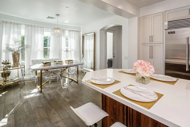 a view of a dining room with furniture window and outside view