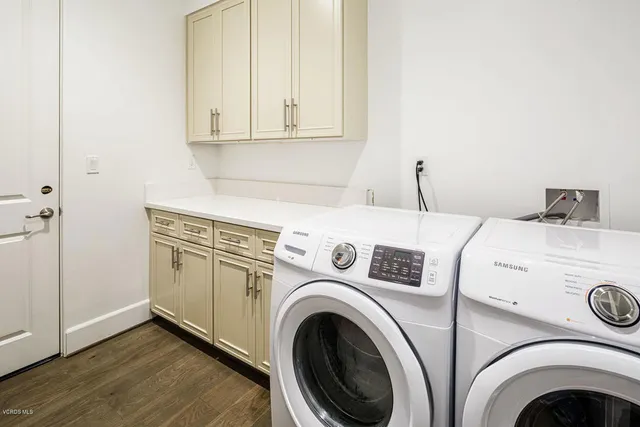 a view of a garden with a building in the background