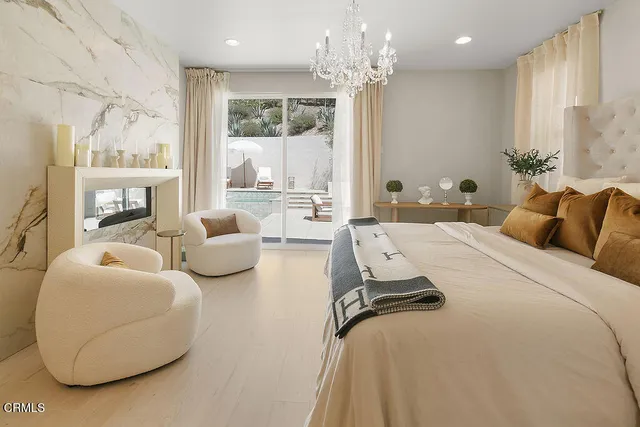 a room with a bed and a view of bathroom