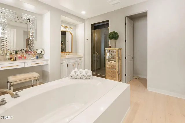 a view of a backyard with sitting area