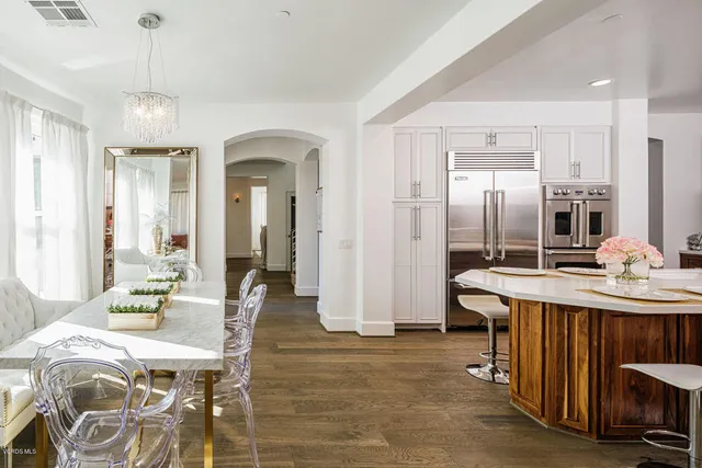 a view of a dining room with furniture