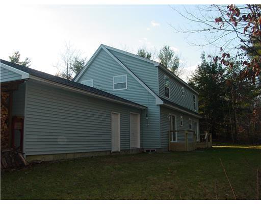 129 Pond Road New Gloucester, ME 04260 - Photo 3 of 20 Exterior Back. TWO REAR ENTRY WAYS...