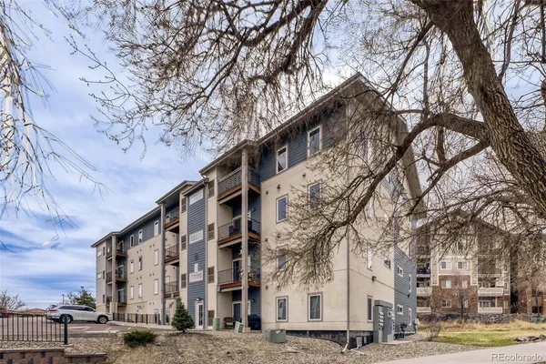 a view of buildings with a street