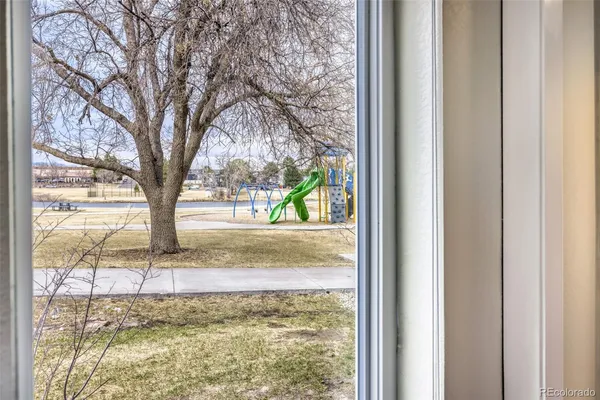 a view of a backyard from a balcony