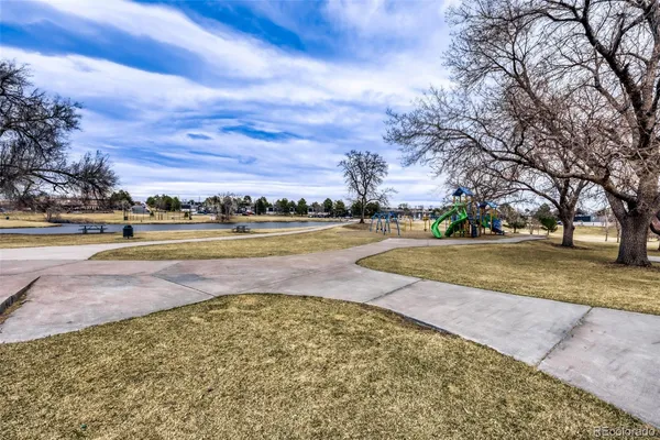 a view of swimming pool with outdoor space and seating area