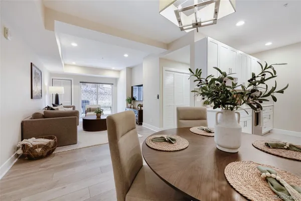 a living room with furniture and a table