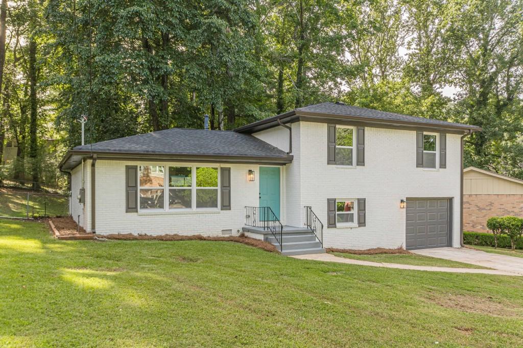2685 Whites Mill Court Decatur, GA 30034 - Photo 1 of 1 a front view of a house with a yard
