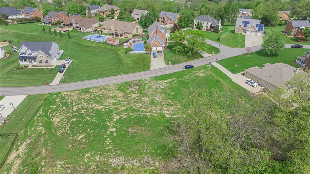 55 Ridgewood Drive McDonald, PA 15057 - Photo 3 of 12 an aerial view of a house with a garden and lake view
