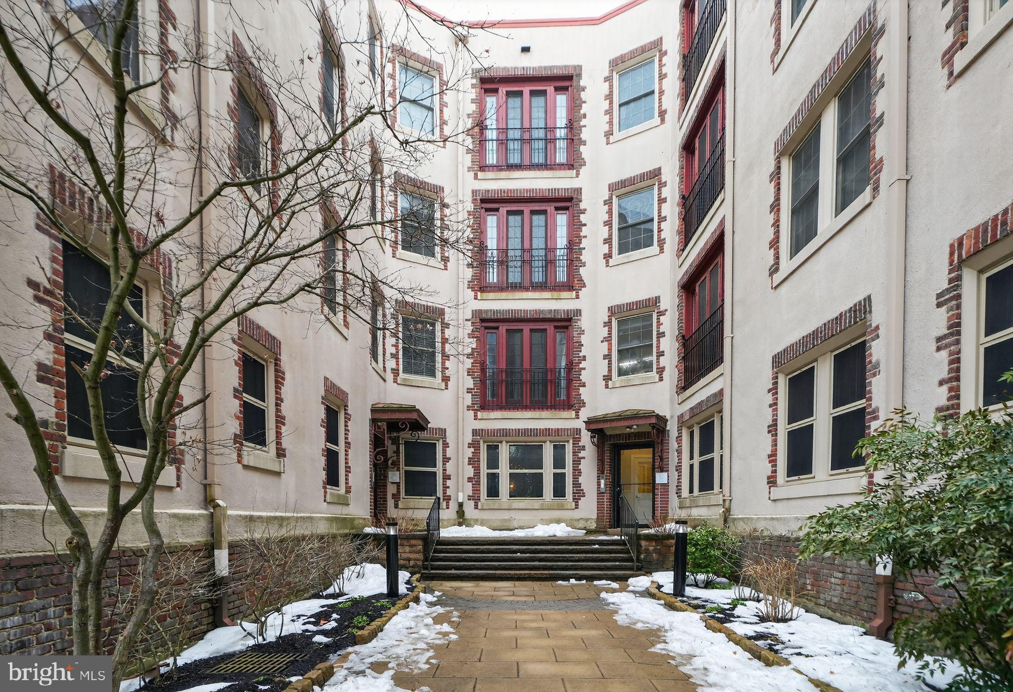 4300 Spruce Street, Unit B304 Philadelphia, PA 19104 - Photo 1 of 26 a front view of a multi story residential apartment building