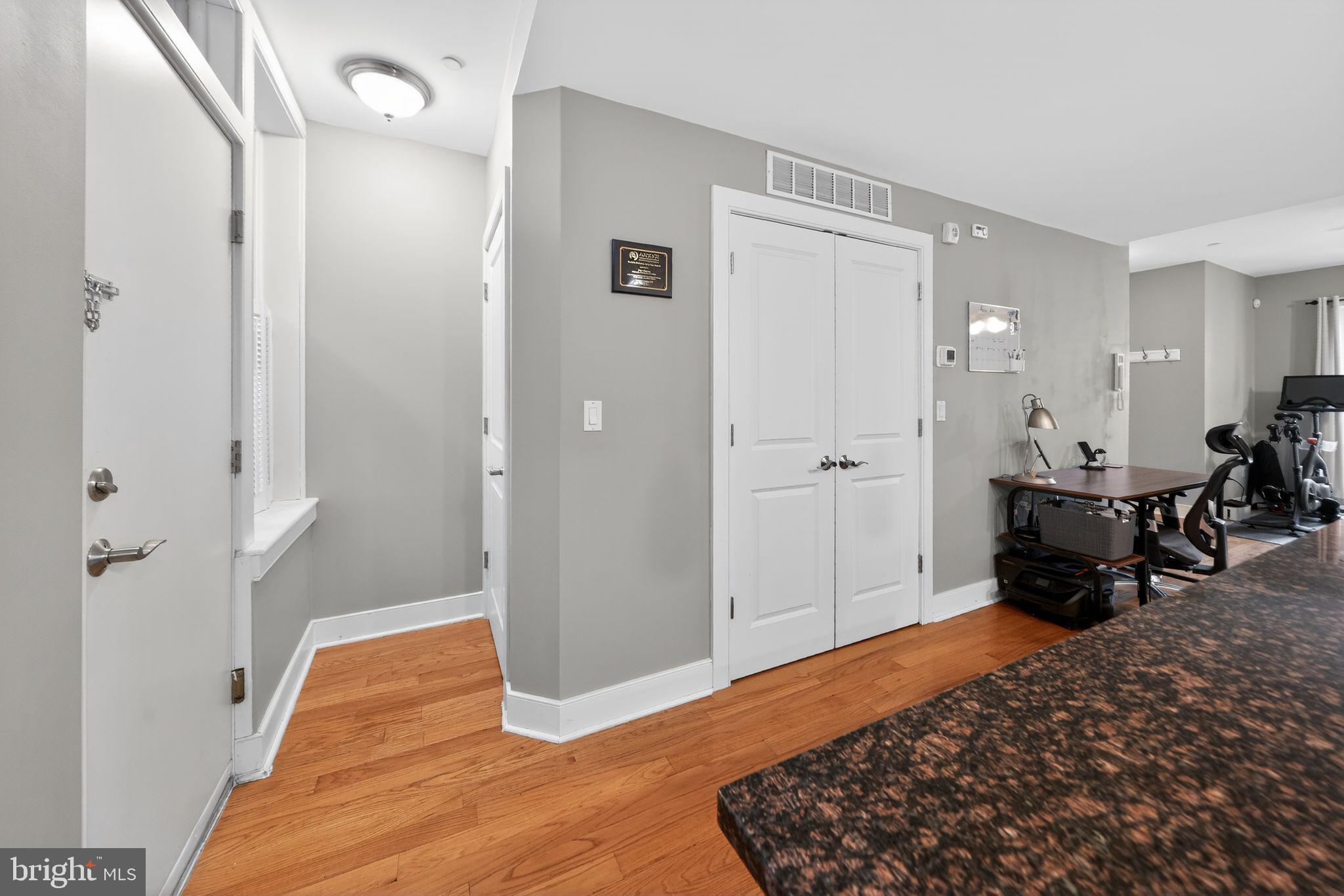 4300 Spruce Street, Unit B304 Philadelphia, PA 19104 - Photo 13 of 26 a bed room with a bed and mirror