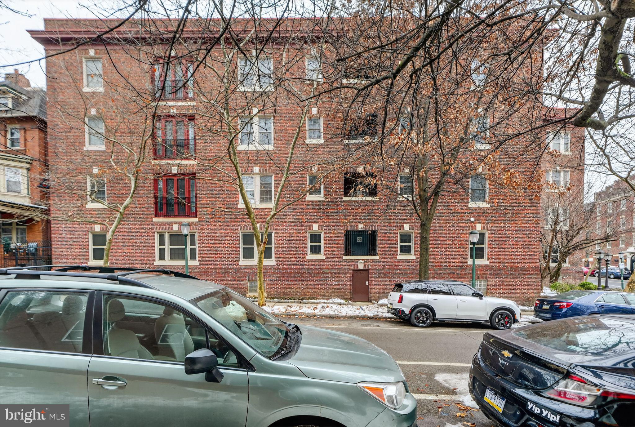4300 Spruce Street, Unit B304 Philadelphia, PA 19104 - Photo 3 of 26 a view of a cars park in front of a building