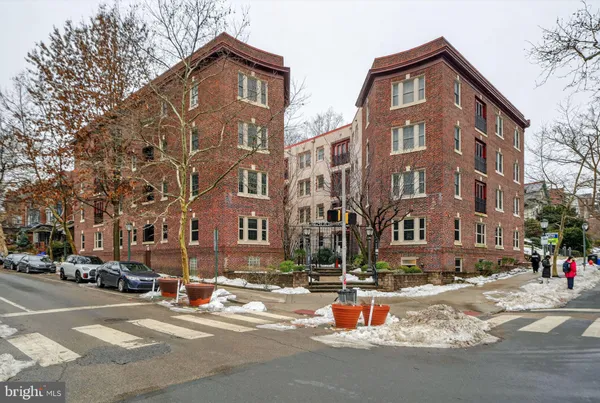 a front view of a building with street view