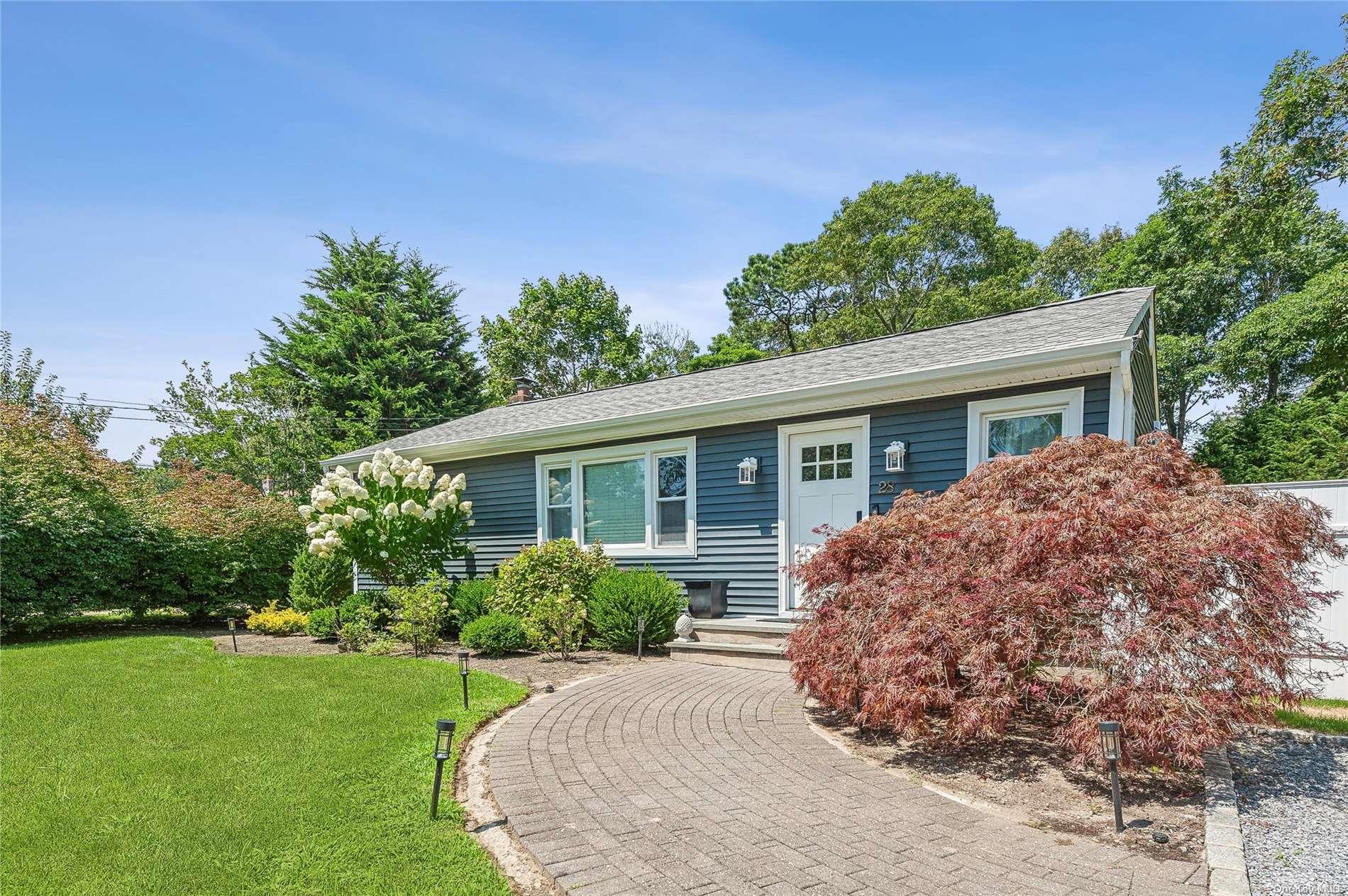 28 Argonne Road West Hampton Bays, NY 11946 - Photo 18 of 24 a view of a house with a yard