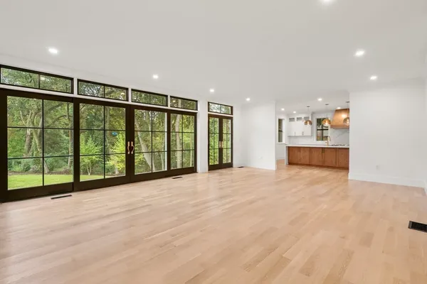 a view of an empty room with a balcony