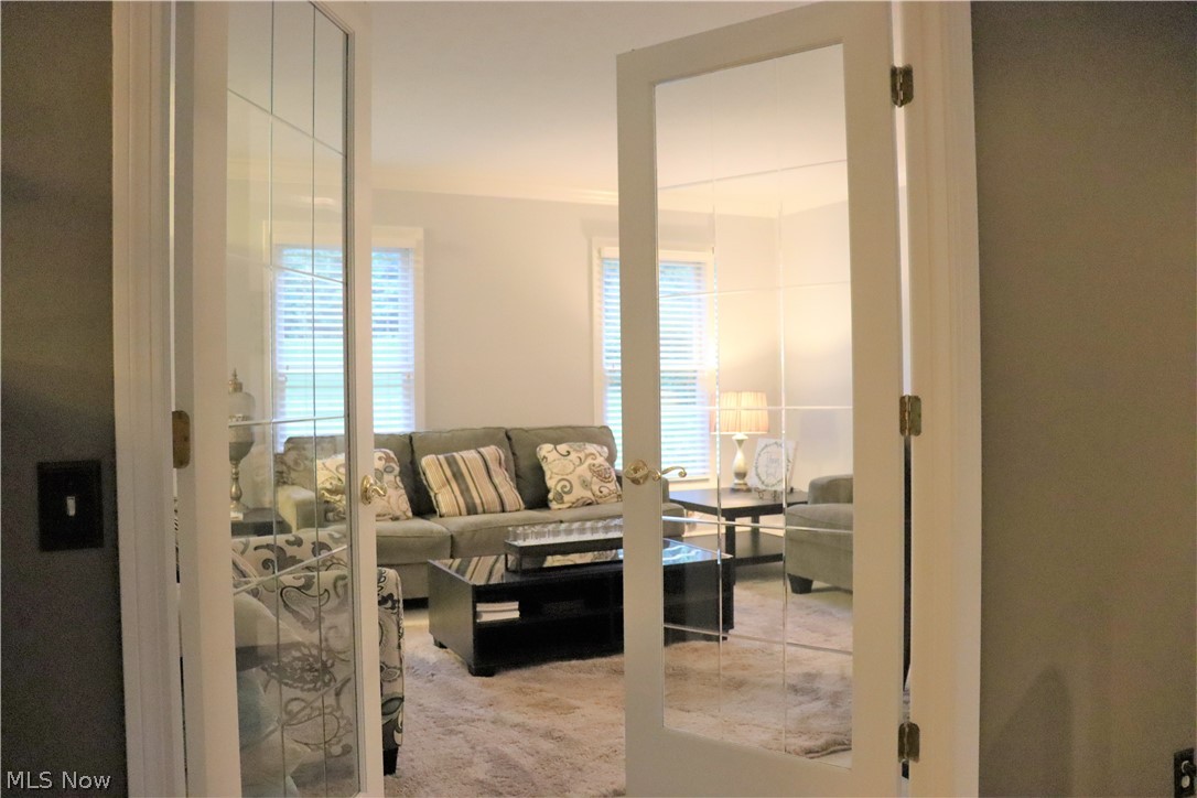 8360 Kinsman Road Novelty, OH 44072 - Photo 11 of 35 French doors from the family room looking into the living room