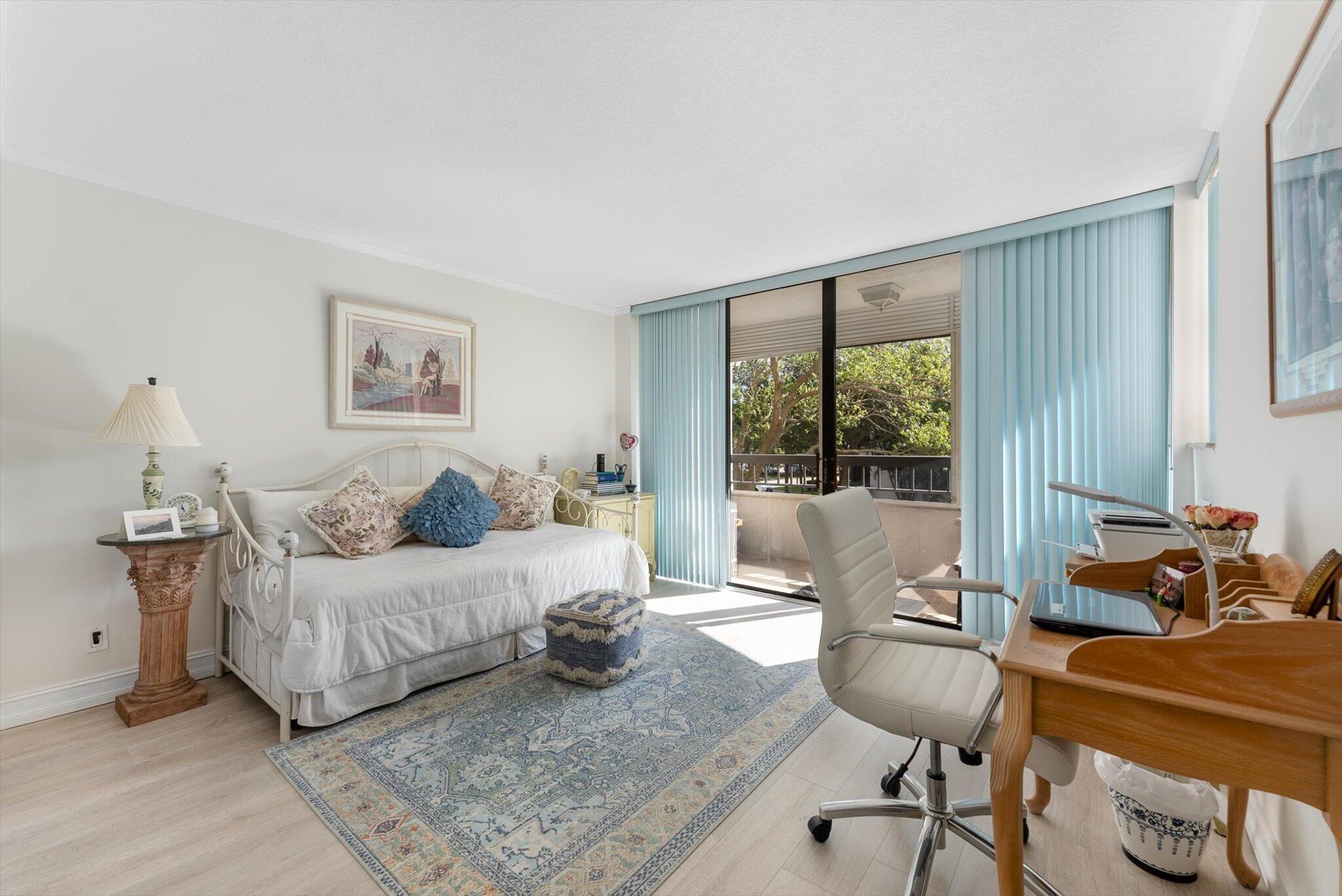 6420 Boca Del Mar Drive, Unit 201 Boca Raton, FL 33433 - Photo 13 of 45 a living room with furniture and a window