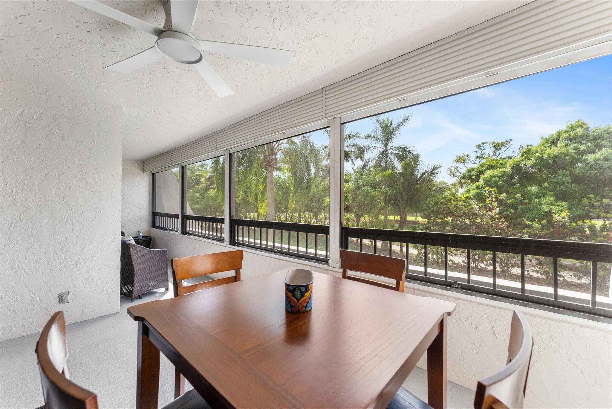 6420 Boca Del Mar Drive, Unit 201 Boca Raton, FL 33433 - Photo 17 of 45 a view of a dining room with furniture window and outside view