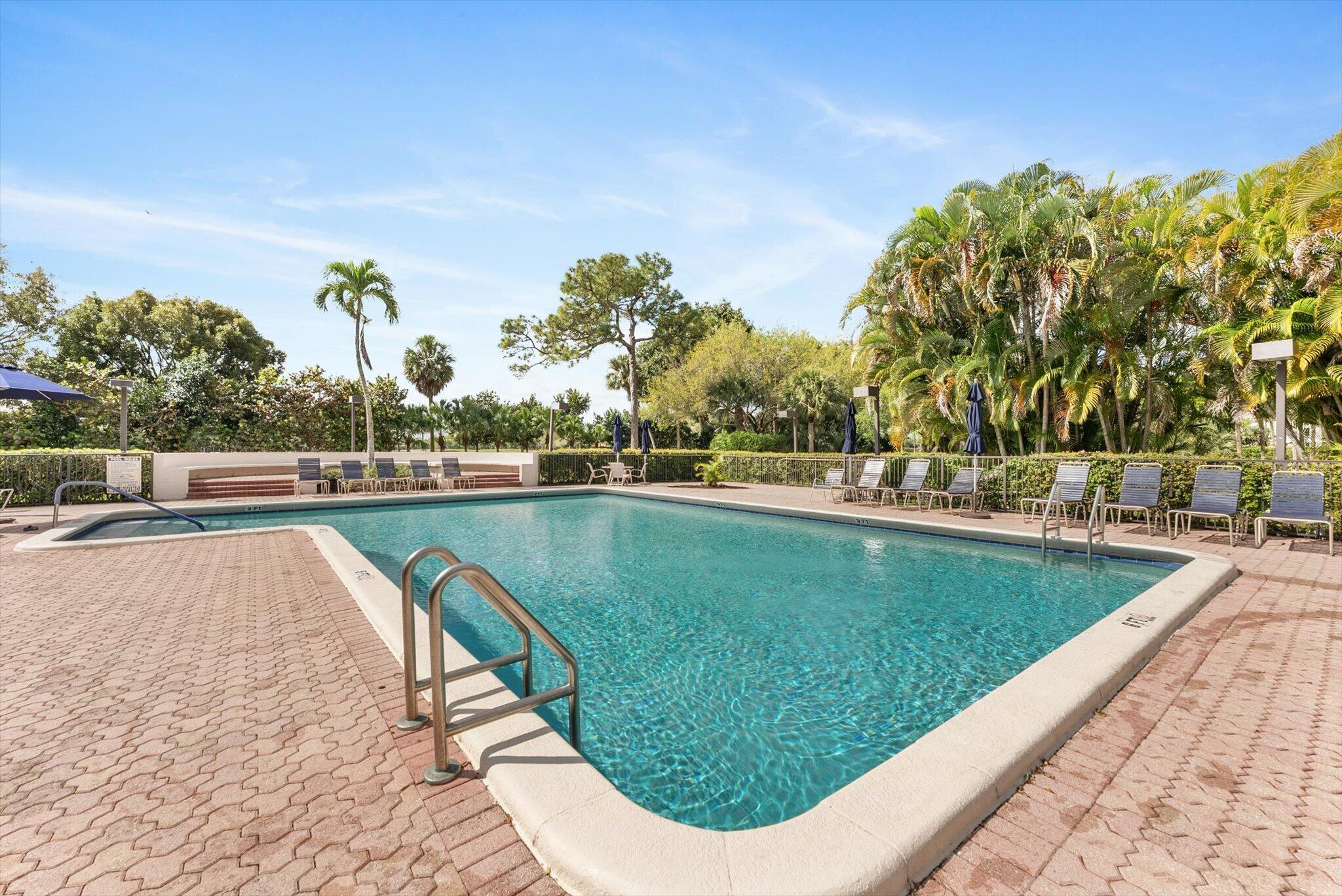 6420 Boca Del Mar Drive, Unit 201 Boca Raton, FL 33433 - Photo 25 of 45 a view of a swimming pool with a yard