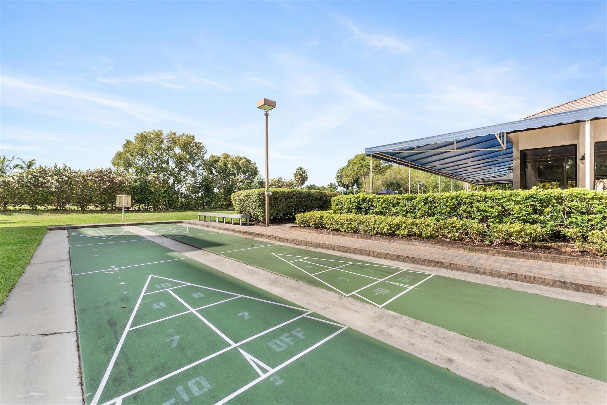 6420 Boca Del Mar Drive, Unit 201 Boca Raton, FL 33433 - Photo 27 of 45 a view of a tennis court