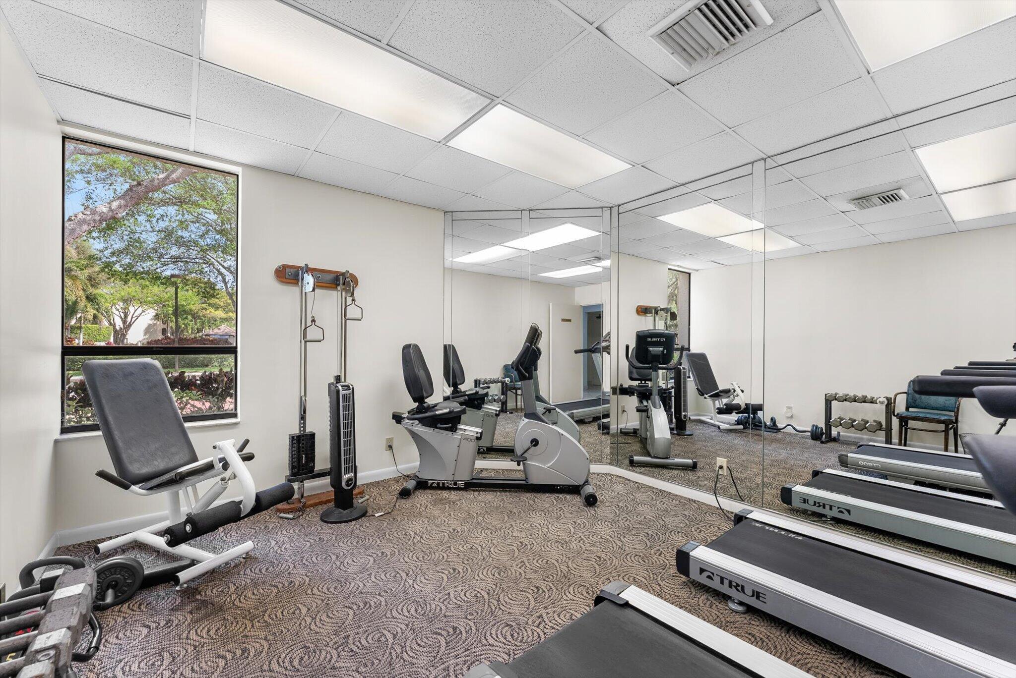 6420 Boca Del Mar Drive, Unit 201 Boca Raton, FL 33433 - Photo 34 of 45 a view of a room with gym equipment