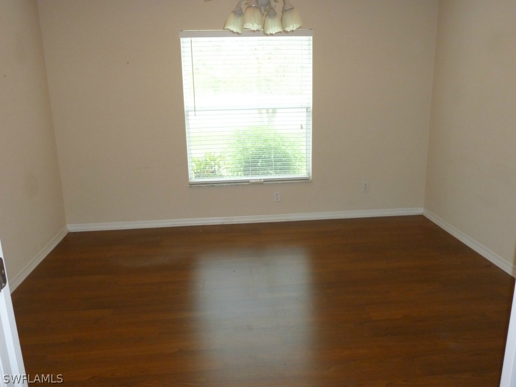 19744 Villa Rosa Loop Fort Myers, FL 33967 - Photo 12 of 14 an empty room with a window