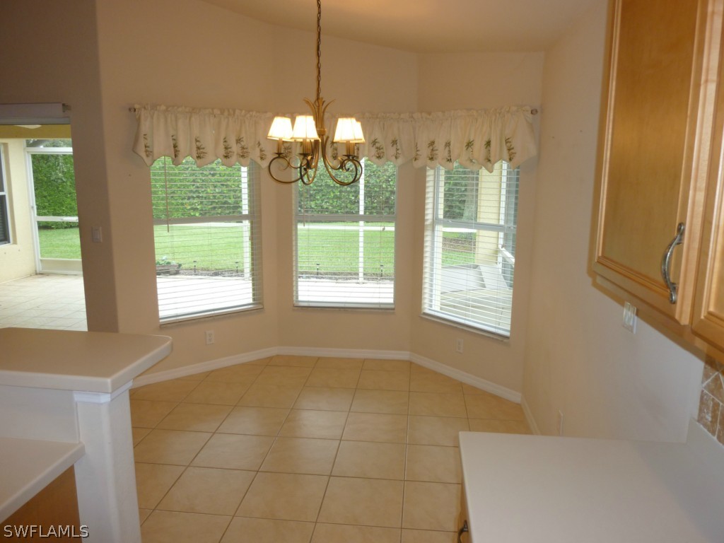 19744 Villa Rosa Loop Fort Myers, FL 33967 - Photo 8 of 14 a view of an empty room with a window